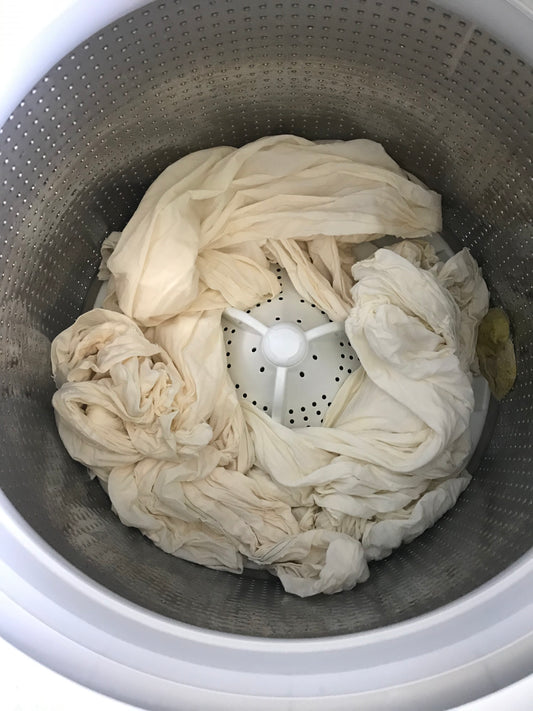 Service de débouillissage, tannage et mordançage : vêtements, accessoires et métrages textiles